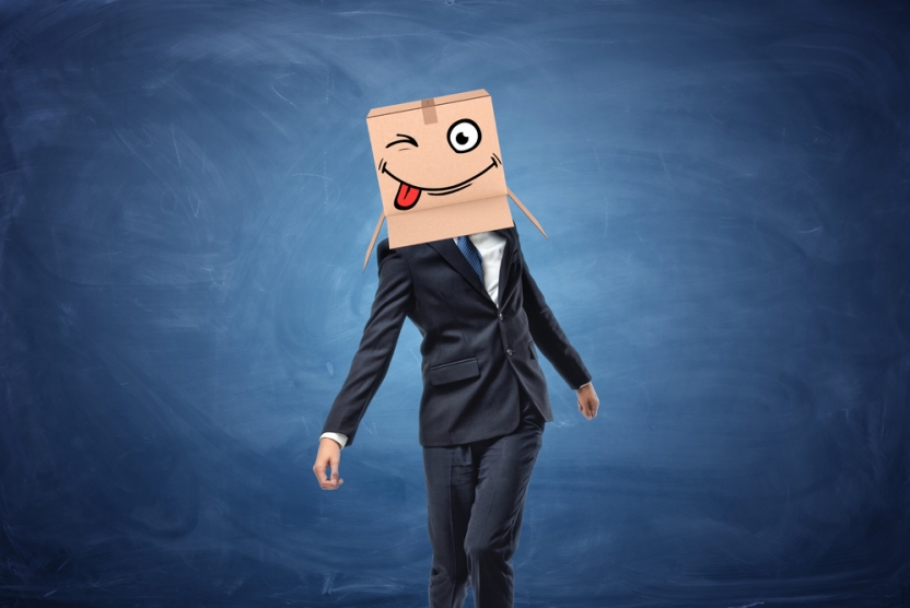 man in a suit with box on his head - Outsmarting the competition