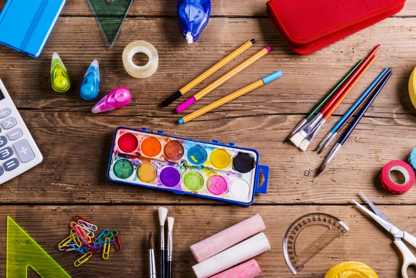 various art supplies on a desk