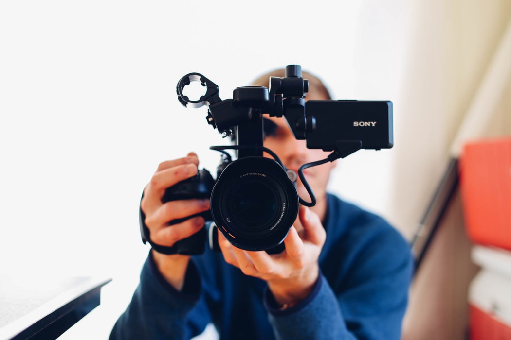 man holding a camera