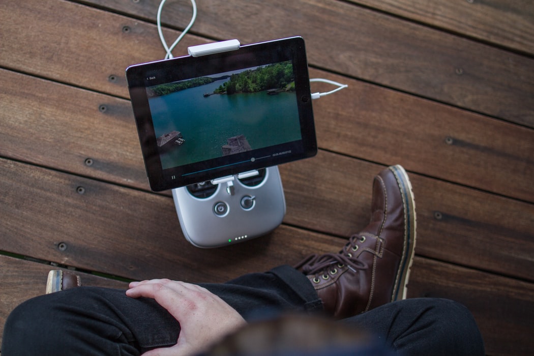 person watching a video on a tablet