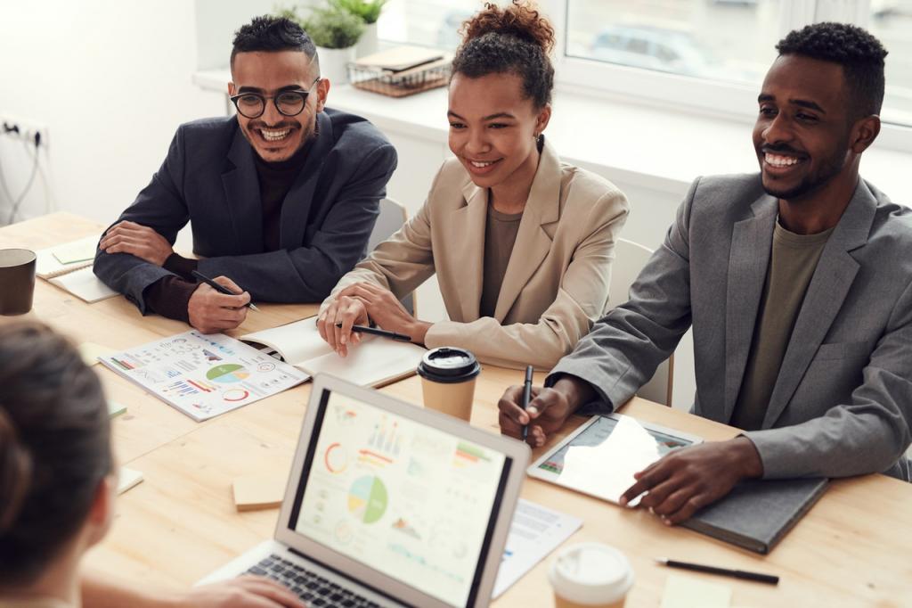 four people discussing social media marketing in an office