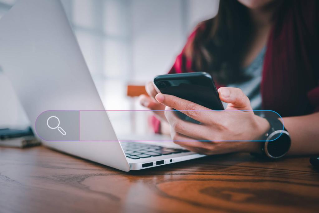 woman using laptop and phone