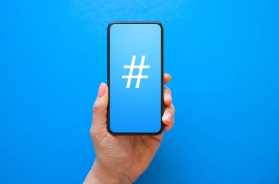 twitter marketing tips - hand holding mobile phone
