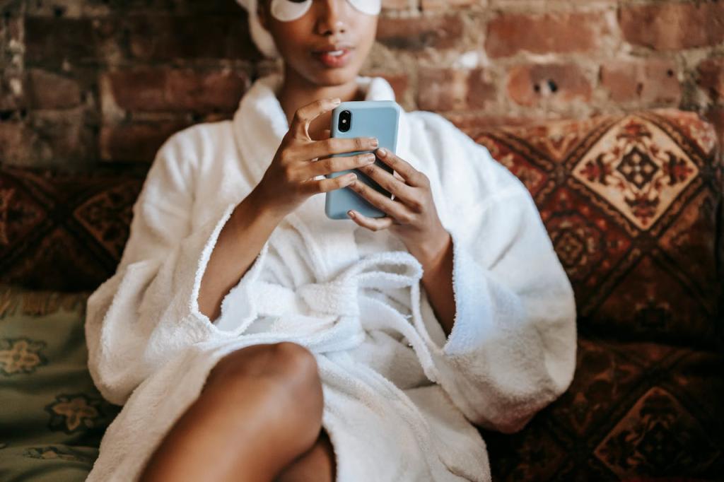 woman in a bathrobe browsing her smartphone